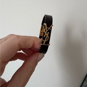 Yves Saint Laurent Black Bracelet with Gold Emblem